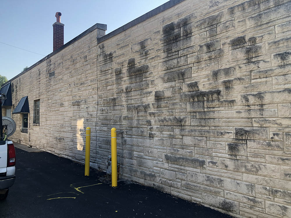 commercial brick siding before cleaning