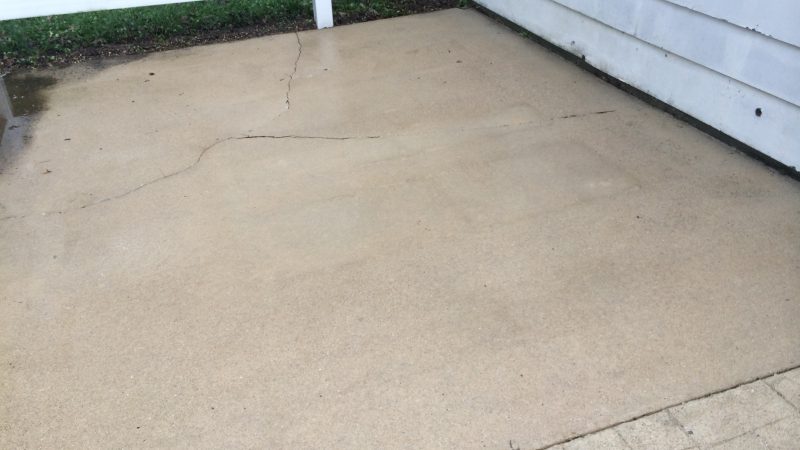 clean driveway after pressure washing