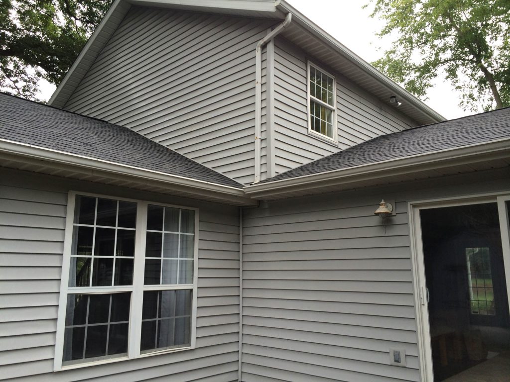 gray house siding after cleaning